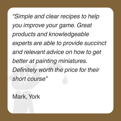 Promotional text reviewing a miniature painting course on a brown background in front of a hand holding a paintbrush