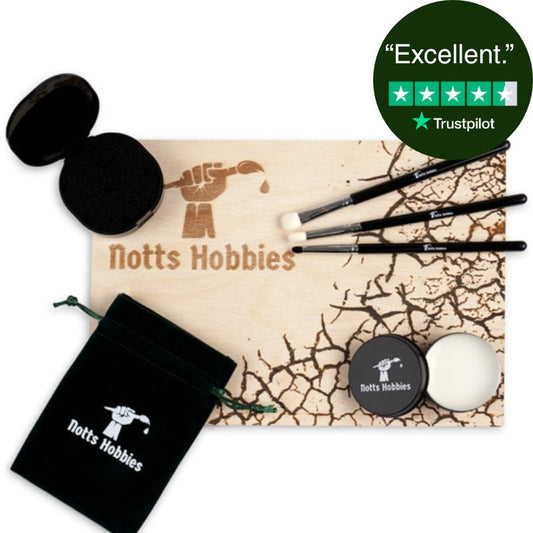 Notts Hobbies drybrush set with 3 drybrushes, dampening sponge, brush soap and texture palette, on a white background.