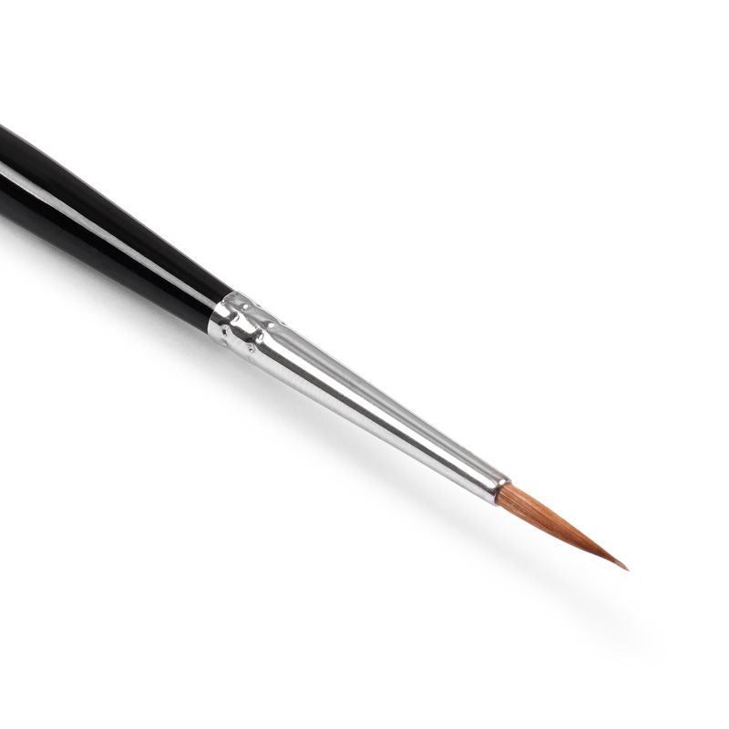 A close-up of a medium paint brush for miniature painting with a black handle, silver ferrule, and brown bristles, shown diagonally on a white background.